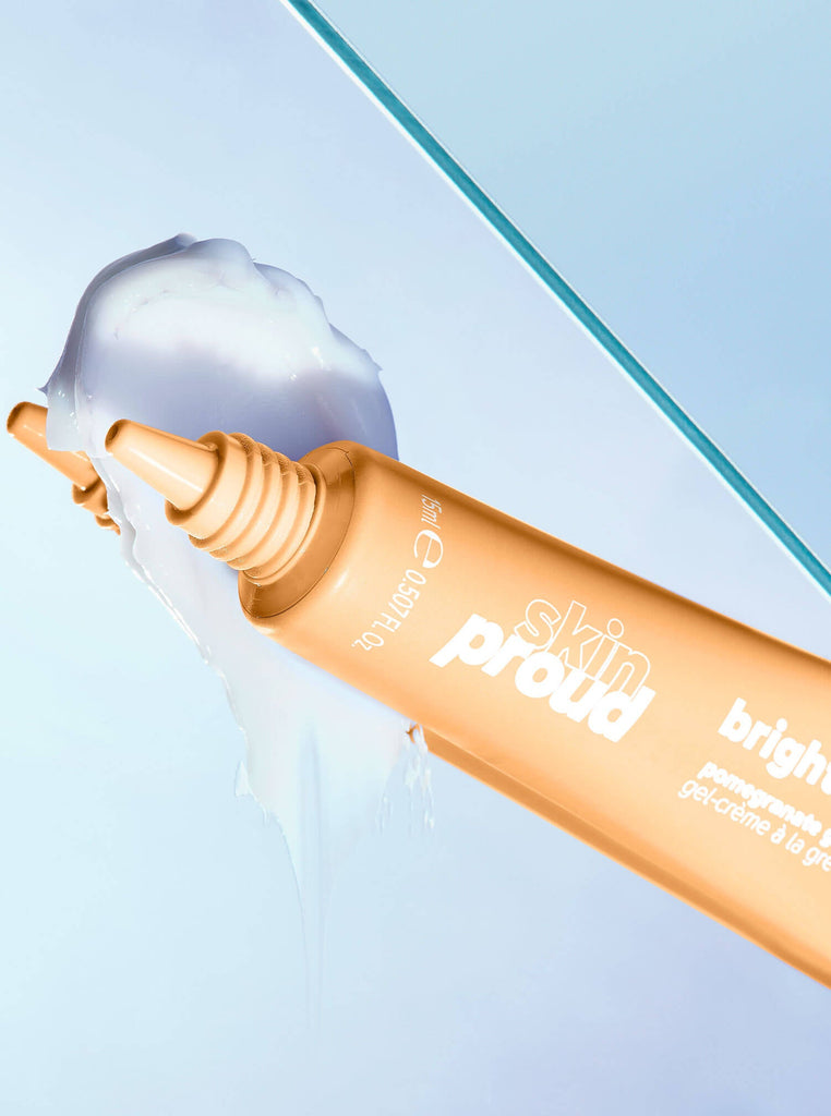 Skin Proud Bright Eye eye cream tube with product texture swtch