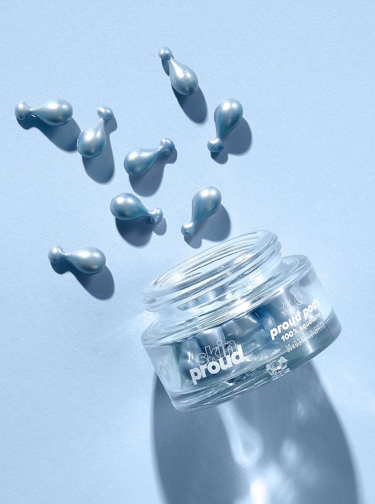 Open container of Proud Pods with pods spilling out